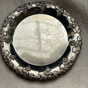 VTG Hong Kong etched grape leaves wine bottle coaster.